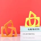 Jax Geometric Yellow Knot Statue Decor, Home Bookcase Centerpiece and Tabletop Sculpture, For Home Decor Accent Cube Ornaments