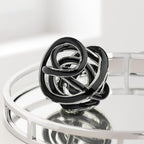 Torre & Tagus Orbit Hand Blown Glass Infinity Knot Sculpture - 4.5 Inch Glass Art Black Knot Decor Ball for Home Decor, Small Centerpiece Table Decoration for Home Interior (Solid Black)