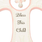 DEMDACO Bless This Child Wall Cross - Blessing Cross for Baby - Faith Nursery Decor - Gift for Newborn - Religious Christian Wall Hanging - Porcelain - Gift Box Packaging - Pink