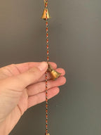 Rastogi Handicrafts Brass Decorative String of 11 Metal Vintage Indian Style Fair Trade Wall Hanging Tiny Bells (1)