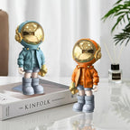Dosker Small Astronaut Statues Mini Spaceman Sculpture Polyresin Arts Gifts Orange Figurine Ornament Room Decor for Men,Home and Desktop Accessories Tabletop Decoration, Living Room, Office, Bookshelf