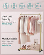 SONGMICS Clothes Rack with Wheels, Clothing Rack for Hanging Clothes, 25.4 mm Metal Garment Rack with Dense Mesh Storage Shelf, 110 lb Load Capacity, 2 Brakes, Gold UHSR025A01