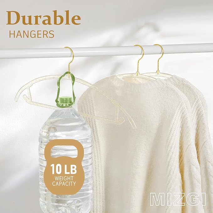MIZGI Premium Clear Hangers with Gold Glitter (50-Pack) - Heavy-Duty Acrylic Suit Hangers with Gold Hooks - No Shoulder Bump Space Saving Clothes Hangers for Jackets, Coats, Dresses