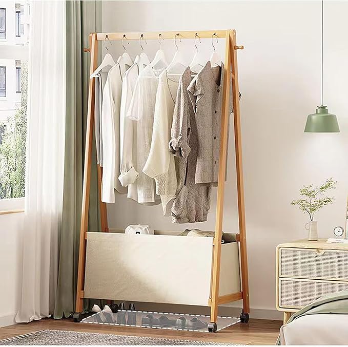 Bamboo Clothing Rack with Top Hanging Garment Rod, 2 Side Hooks & Bottom Fabric Storage Basket and 360° Rotating Wheels, Space-Saving Organizer for toys, Hats, Bags & folded clothes