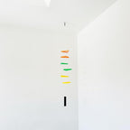 Tri-Tone Harmony Mobile: A Vibrant Orange, Green, and Yellow Hanging Décor with Six Dynamic Triangles