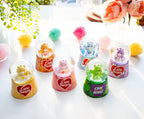 Care Bears Good Luck Bear Light-Up Mini Adult Snow Globe with Glitter Display | 2.5 Inches Tall