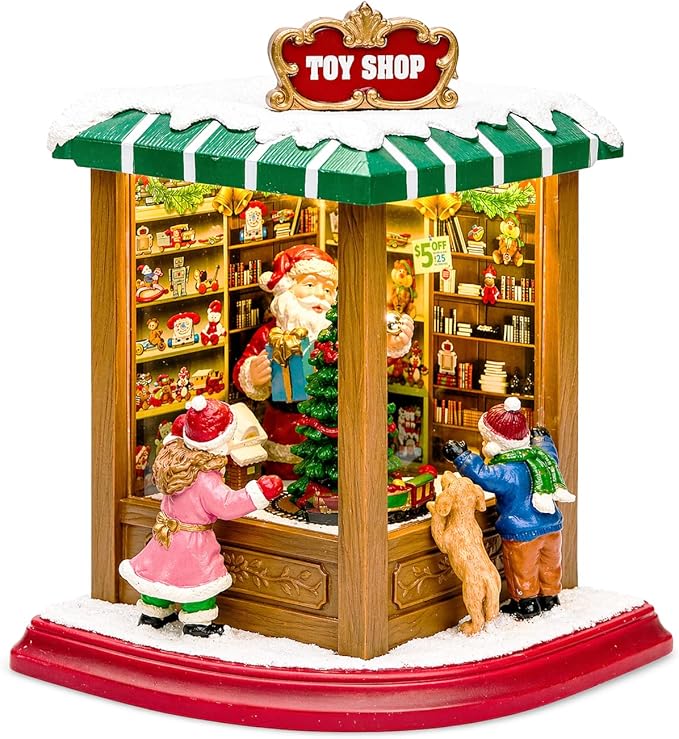 MOMENTS IN TIME Lighted Santa’s Christmas Village Shop LED Lights, Music & Animation Battery Operated 8.8” Holiday Building Christmas Decoration