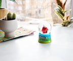 Silver Buffalo Peanuts Group Walk Outside Light Up Snow Globe, 55 mm
