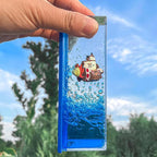 Unsinkable Thousand Sunny Pirate Ship in a Bottle, Non Sinking OP Anime Boat Model Fluid Drift Bottle Decorations Desk Decor Ornament for Boys Girls Gift (Blue-h)