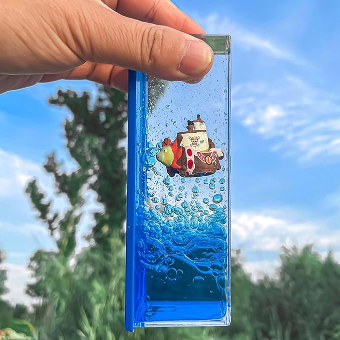 Unsinkable Thousand Sunny Pirate Ship in a Bottle, Non Sinking OP Anime Boat Model Fluid Drift Bottle Decorations Desk Decor Ornament for Boys Girls Gift (Blue-h)