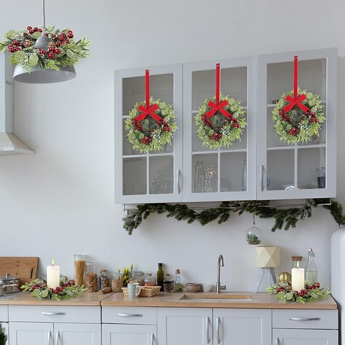 8 Pcs 9 Inch Christmas Artificial Wreaths for Kitchen Cabinet Norfolk Pine Garland with Red Berries Pinecones Wreaths Swags Snowy Pine Candle Rings Holder for Christmas Decorations Table Centerpiece