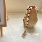 OMISHE Wood Bead Garland with Tassels 61 Inches, Boho Farmhouse Wooden Decorative Beads for Home Tiered Tray Decor, Beige Black