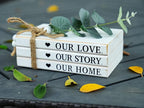 3 Pieces Wooden Decorative White Books, Rustic Farmhouse Faux Books for Coffee Table Shelves with Wood Bead Tassels and Leaves, 7'x 4.6'x 2.5' (Our Love, Our Story, Our Home)