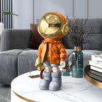 Dosker Astronaut Statues Spaceman Sculpture Polyresin Arts Gifts Orange Figurine Ornament Room Decor for Men,Home and Crafts Desktop Accessories Tabletop Decoration, Living Room, Office, Bookshelf