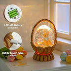 Easter Snow Globe Basket Easter Bunny Eggs Decorations Gifts Auto Snowfall Glitter Music Collection with 6H Timer USB/Battery Powered 6.4 Inch