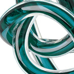 Torre & Tagus Orbit Hand Blown Glass Infinity Knot Sculpture - 4.5 Inch Glass Art Teal Knot Decor Ball for Home Decor, Small Centerpiece Table Decoration for Home Interior (Clear Teal)