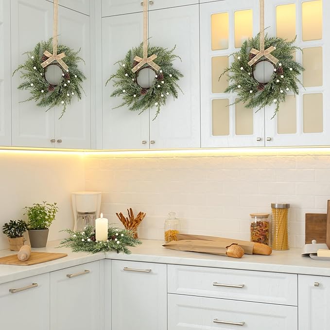 8 PCS Christmas Wreath Christmas Kitchen Cabinet Wreaths with Burlap Ribbon Mini Wreath Pine Garland Frosted Cedar Pine Cone Hanging Garlands Candle Rings for Front Door Window Chair Wall