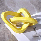 LCCCK Infinity Knot Sculpture Yellow Knot Decor Object, Abstract Knick Knacks Coffee Table Modern Statue, Yellow Sculpture for Home Living Room Table Ornaments and TV Stand Bookshelf Decorative