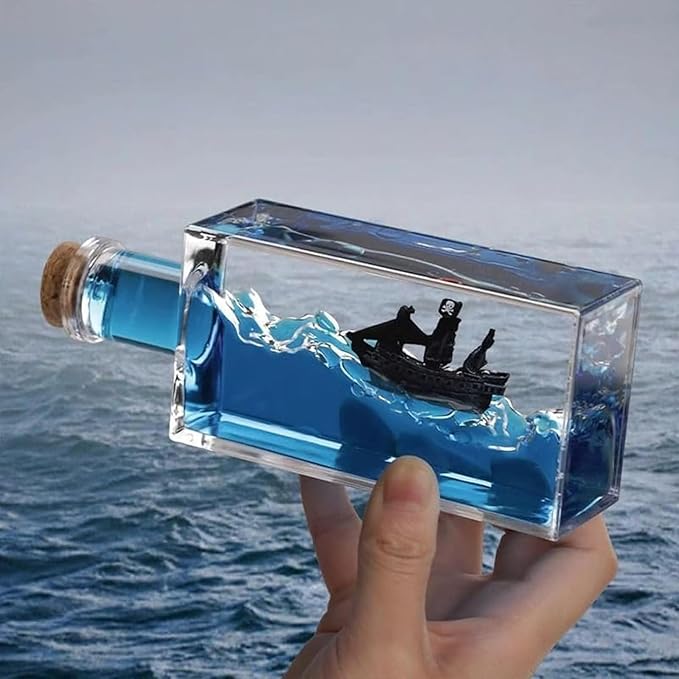 Unsinkable Black Pearl Pirate Ship in a Bottle - Ghost Ship in Ocean Wave Desk Decor for Home Office Decors, Unique Birthday Gifts for Men & Pirate Lovers, Liquid Motion Art Desktop Ornament (Black-e)