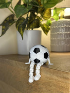Soccer Ball Buddy Figurine with Articulated Legs, Decorative Sports Collectible, Desktop Shelf Decor, White and Black, Unique Gift for Soccer Enthusiasts