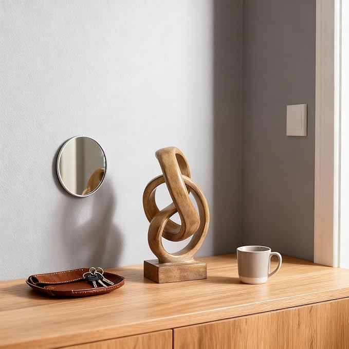 Abstract wood-toned knot sculpture, geometric decorative statue, wood-toned accent piece for living room coffee table or bookshelf surface, office TV cabinet or entryway console table decoration.