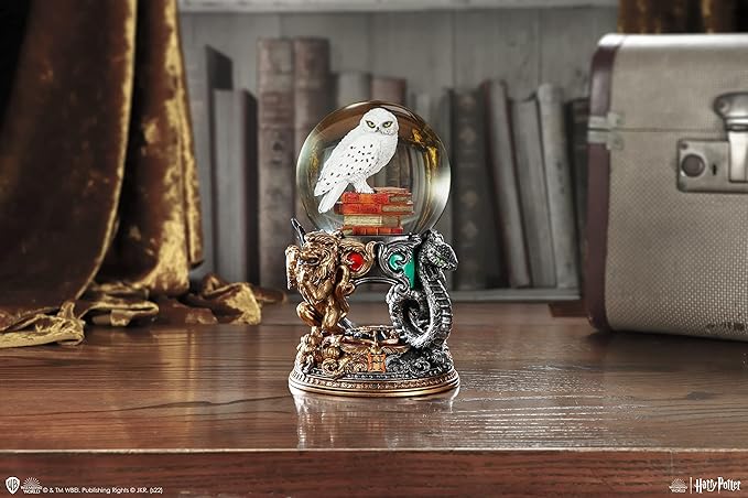 Nemesis Now Harry Potter Hedwig Snow Globe - Officially Licensed Collectible with Hand-Painted Detail, Hogwarts House Emblems, Perfect Harry Potter Gift, Owl Resin Figurine Home Decor