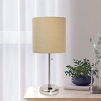 Oslo 19.5" Contemporary Bedside Power Outlet Base Standard Metal Table Desk Lamp in Brushed Steel with Tan Drum Fabric Shade