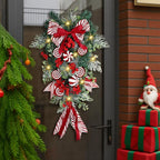 Yunlly 28" Pre Lit Christmas Teardrop Swag Battery Operated Christmas Swag with Lights, Red and White Bowknot, Swirl Candy Cane Ball, Xmas Wreath Ornament for Indoor Outdoor Front Door Decoration