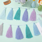 WILLBOND 4 Pieces Valentine's Day Tassel Garland for Classroom Wall Decor Boho Pastel Garland Cotton Tassel Banners for Party School(6.2 Inch,Purple Colors)